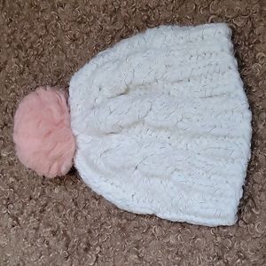 White winter kids hat with pink bubo